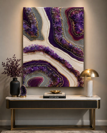 Modern entryway console with large purple amethyst geode wall art, marble-top table, brass dome lamp, black ribbed vase with foliage and a small crystal display — stylish contemporary home decor.