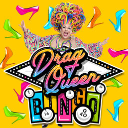 Colorful event poster of a flamboyant drag performer with a rainbow curly wig and swirly psychedelic robe bursting from a retro marquee that reads "Drag Queen Bingo", surrounded by numbered bingo balls and neon high-heeled shoes on a bright yellow background.