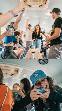 Energetic party bus interior with friends laughing, raising canned drinks and cheering along bench seats; close-up of a woman in a blue cap happily sipping from a can.