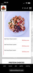 Top-down shot of a hibachi-style plate with grilled shrimp, scallops, lobster, cubed steak and mixed vegetables on a white plate, shown above menu pricing for adult and kids options.