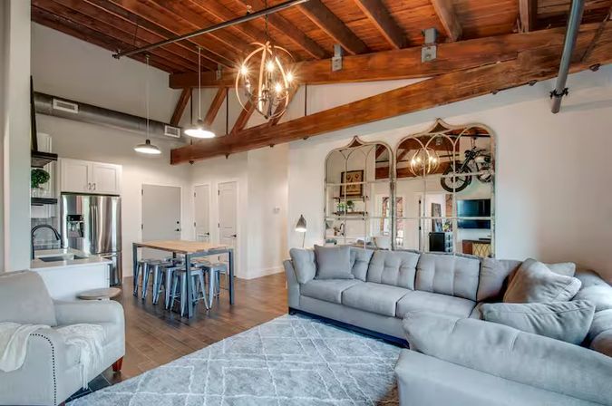 Speakeasy Loft: Historic Warehouse Stay Minutes to Broadway image 5