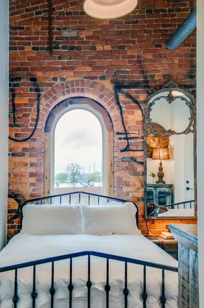 Speakeasy Loft: Historic Warehouse Stay Minutes to Broadway image 16