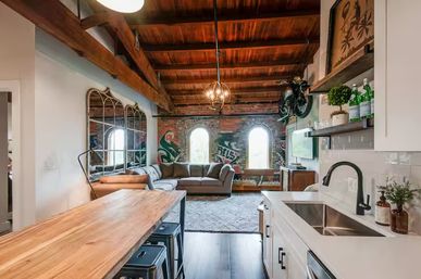 Speakeasy Loft: Historic Warehouse Stay Minutes to Broadway image 2