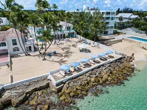 Emerald Wave Beachfront Estate: 10 Bedrooms with Pool & Private Beach Access image 1