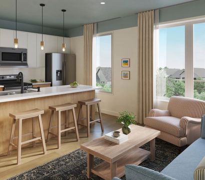 Bright modern open-concept kitchen and living area with white quartz island and three wooden bar stools, stainless steel appliances, pendant lights, large windows overlooking suburban greenery, striped armchair, blue sofa and light wood coffee table.