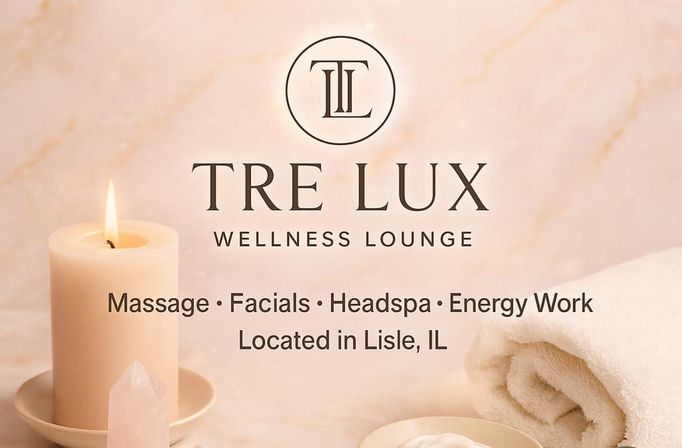 Soothing spa promo: lit pillar candle, rose quartz crystal, rolled towel and small bowl of cream beside a minimalist wellness lounge logo and listed services—massage, facials, headspa, energy work.
