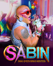 Energetic drag queen bingo hostess in a glittery outfit and heart-shaped sunglasses holding a wad of cash, entertaining a cheering crowd at a colorful LGBTQ+ bingo night and community bar event