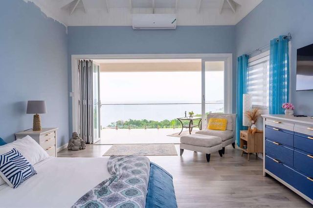 The Rising Sun Villa: Luxury Rental with with Infinity Pool, Hot Tub & City Views image 3