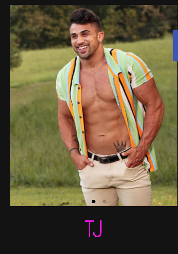 Smiling shirtless fit man wearing an open pastel-striped summer shirt and beige pants, hands in pockets, posing in a sunlit green field — casual outdoor portrait