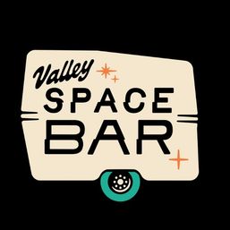 Retro camper-shaped logo on black background with bold "SPACE BAR" text, script word above, teal wheel and orange star accents.