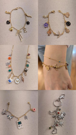 Flatlay collage of assorted charm jewelry: multiple gold charm bracelets with bows, initials, flowers, birds, a mini Game Boy and donut charm, one silver charm keychain, and a photo of stacked bracelets on a wrist, displayed on beige fabric.