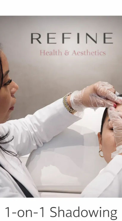 Skincare clinician wearing gloves performing a forehead treatment on a reclining client in an aesthetic clinic during a one-on-one shadowing/training session