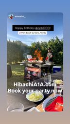 Outdoor hibachi chef cooking on a flaming flat-top grill at a birthday party in Palm Beach Gardens, Florida, lawn setting with tables set with plates, salad bowls and wine glasses.