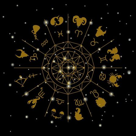 Gold astrology zodiac wheel with 12 horoscope symbols arranged around a geometric star mandala on a black, starry cosmic background — celestial horoscope design