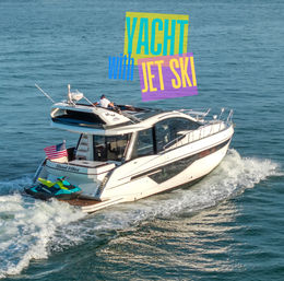 White luxury yacht cruising on blue water with a green-and-teal jet ski on the swim platform, American flag at the stern, colorful "YACHT with JET SKI" text overlay.