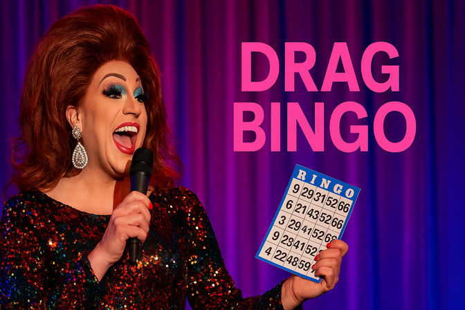 Drag performer in a sparkling sequin dress, big red wig and dramatic makeup holding a microphone and a bingo card on a purple-curtained stage beneath bold pink "DRAG BINGO" text.