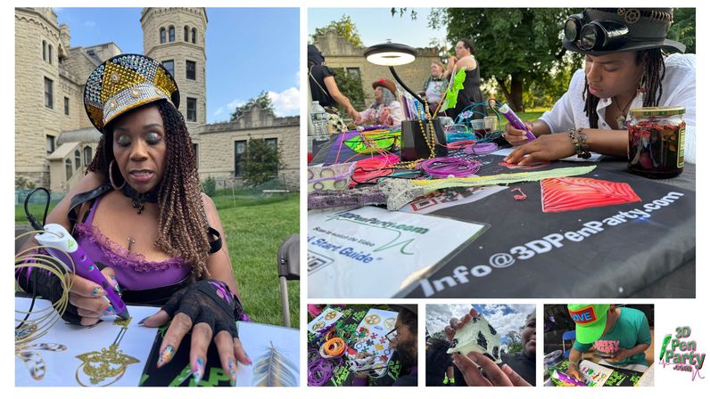 Outdoor 3D-pen craft workshop on a lawn by a historic stone building, participants in colorful steampunk hats making bright filament sculptures at a busy table.