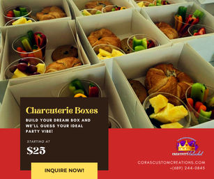 Overhead view of multiple white takeaway charcuterie boxes with croissants, cookies, cups of cheese, grapes and veggie sticks, with a promotional overlay advertising charcuterie boxes starting at $25.
