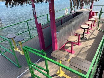 Floating Paradise Awaits — Cruise Lake St. Clair in Tiki Style. image