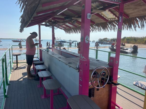 Floating Paradise Awaits — Cruise Lake St. Clair in Tiki Style. image 5