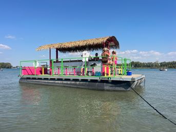Floating Paradise Awaits — Cruise Lake St. Clair in Tiki Style. image 4