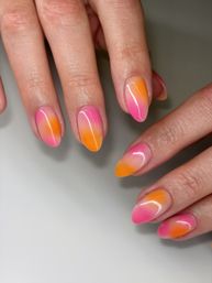 Close-up of glossy almond-shaped ombre nails in bright pink and orange gradient — trendy summer gel manicure, salon-style nail art on hands.