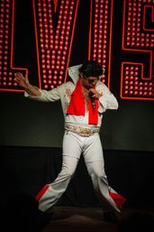Cowboy & Cowgirl Night Out: Saloon, BB Gun Gallery, Axe Throwing, BBQ Dinner + Live Show! image 16