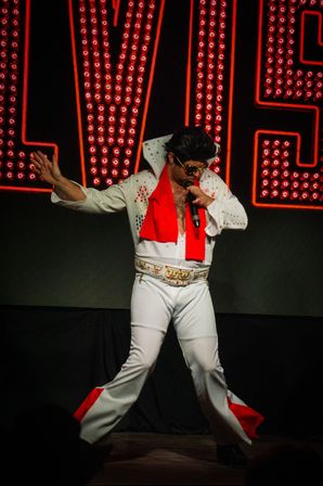 Cowboy & Cowgirl Night Out: Saloon, BB Gun Gallery, Axe Throwing, BBQ Dinner + Live Show! image 16