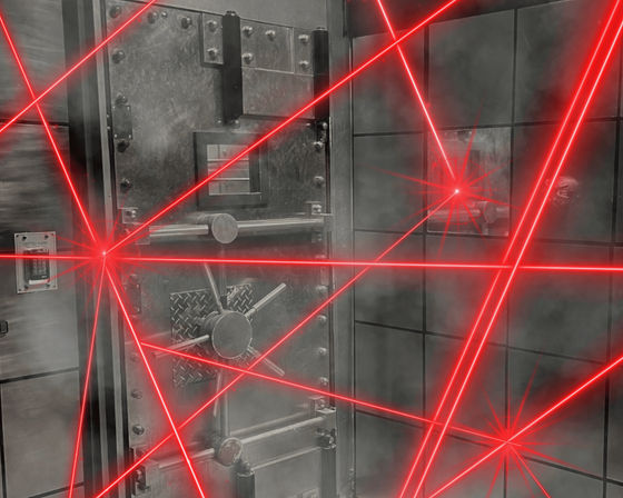 Steel vault door with locking wheel inside a smoky secure room, crisscrossed by bright red laser security beams.