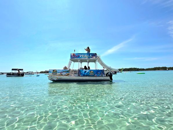 Crab Island Pontoon Party with Three Slides, Paddleboards, Lily Pad + Cooler image 9